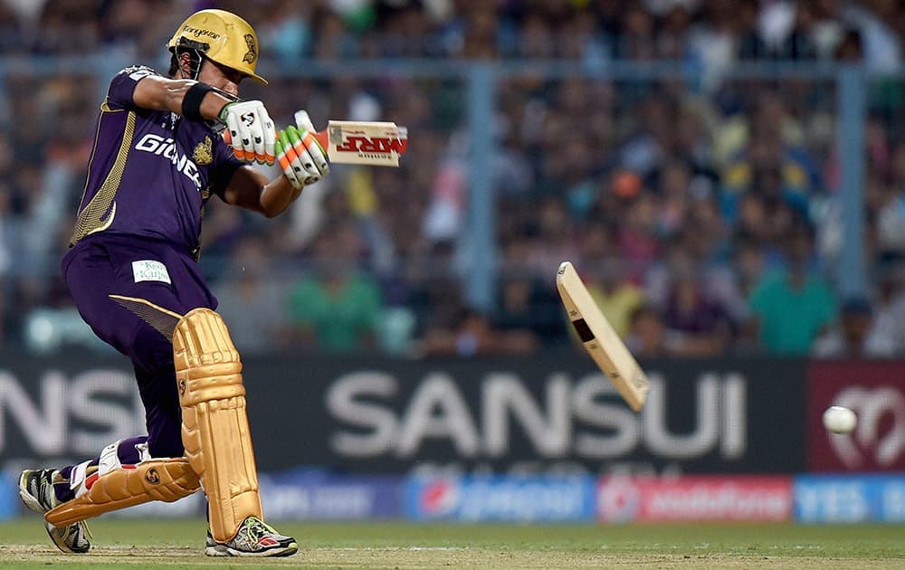 KKR Captain Gautam Gambhirs bat breaks as he plays a shot during their IPL-2015 match against Mumbai Indians at Eden Garden in Kolkata.