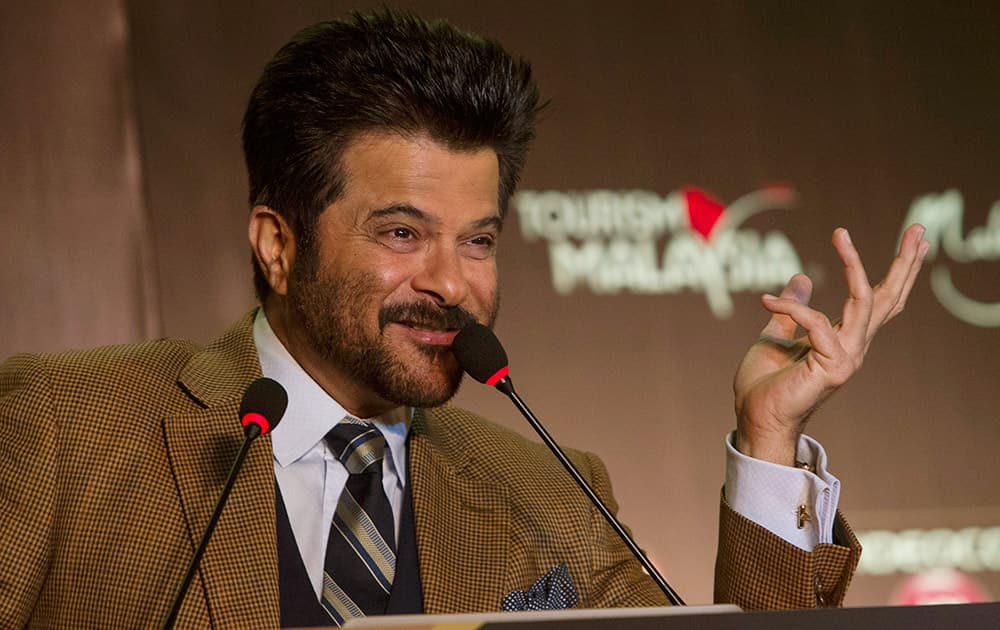 Anil Kapoor smiles during the International Indian Film Awards (IIFA) press conference at a hotel in Kuala Lumpur, Malaysia. The 16th IIFA is scheduled for June 5-7 in Malaysia. 