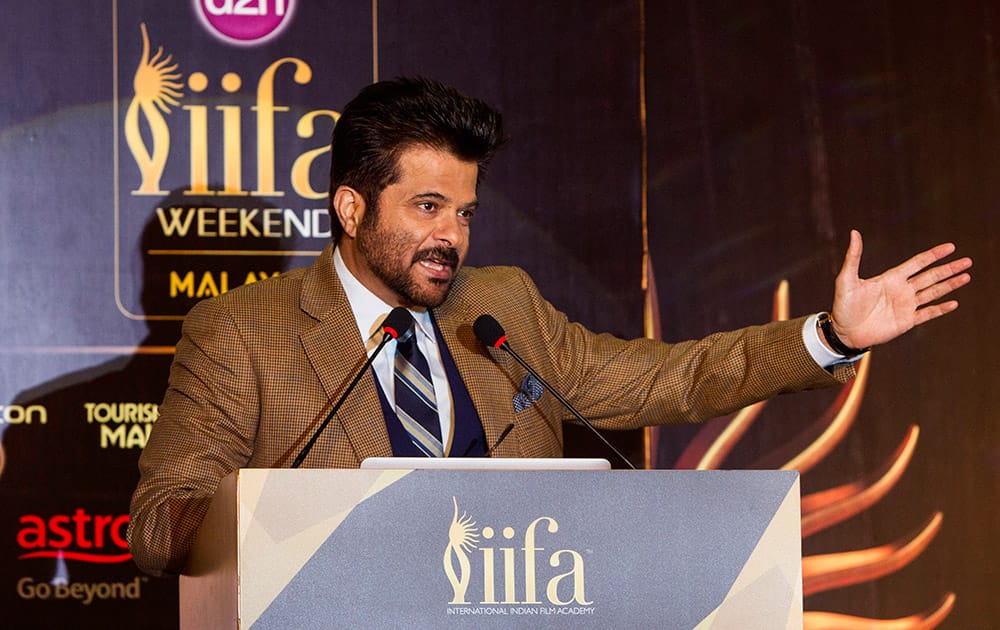 Anil Kapoor gestures during the International Indian Film Awards (IIFA) press conference at a hotel in Kuala Lumpur, Malaysia. The 16th IIFA is scheduled for June 5-7 in Malaysia.