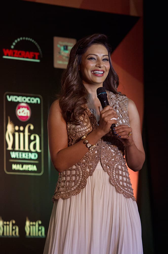 Bipasha Basu reacts to a question during the International Indian Film Awards (IIFA) press conference at a hotel in Kuala Lumpur, Malaysia. The 16th IIFA is scheduled for June 5-7 in Malaysia.