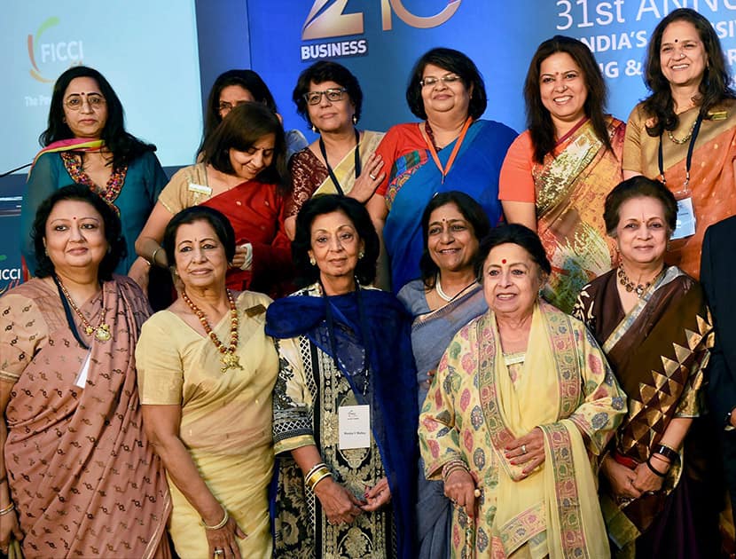 FLO President Archana Garodia Gupta and MP Meenakshi Lekhi during a group photo of FLOs past presidents at the 31st FLO annual session in New Delhi.