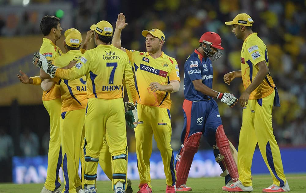 Chennai Super Kings’ Ashish Nehra celebrates along with teammates after dismissing a Delhi Daredevils batsman Shreyas Iyer during their IPL-2015 match against Delhi Daredevils at MAC Stadium in Chennai.