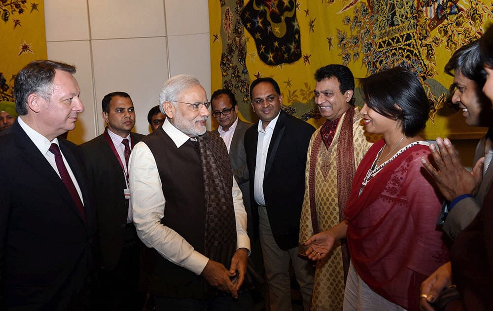 Prime Minister Narendra Modi meets people of Indian community upon his arrival at the Paris Orly International airport in France.