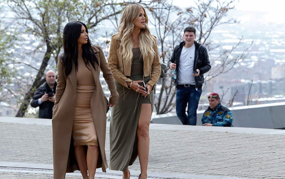 Kim Kardashian and sister Khloe Kardashian walk in Victory Park while filming in Yerevan, Armenia.