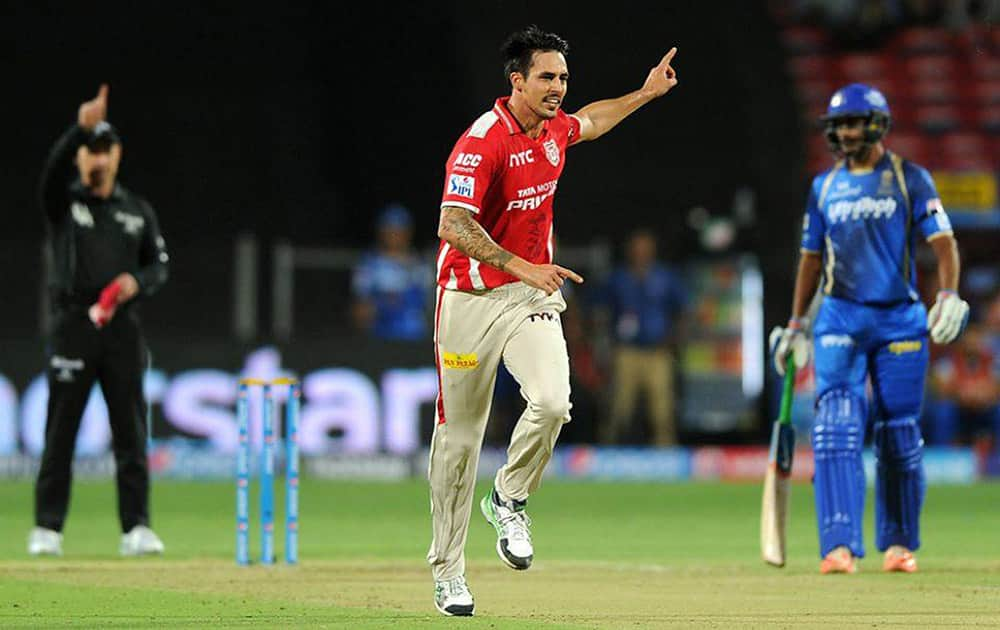 Mitchell Johnson of Kings XI Punjab appeals successfully for the wicket of Stuart Binny of Rajasthan Royals during an IPL match in Pune.