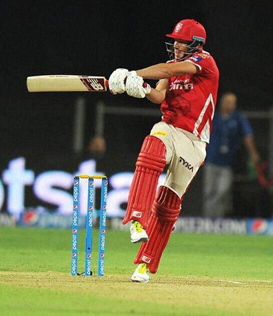 Kings XI Punjab player David Miller plays a shot during the IPL 2015 match against Rajasthan Royals in Pune.