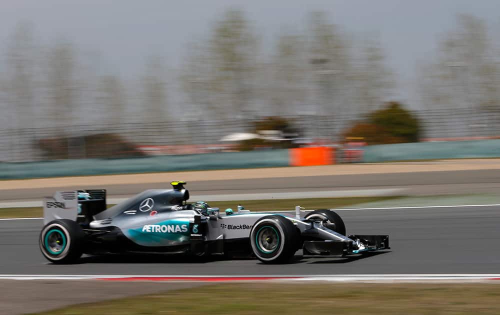 Mercedes driver Nico Rosberg of Germany steers his car during the third practice session for the Chinese Formula One Grand Prix at Shanghai International Circuit in Shanghai, China.
