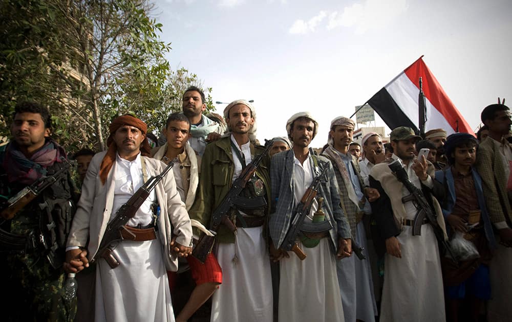 Shiite rebels, known as Houthis, gather during a protest against Saudi-led airstrikes.