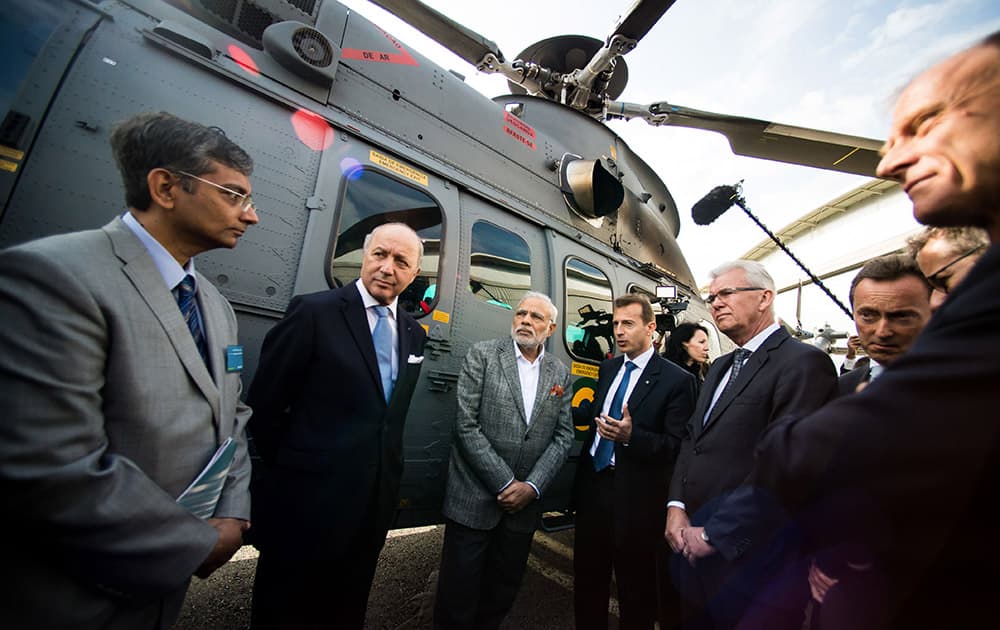 Prime minister Narenda Modi and French Foreign Minister Laurent Fabius, second left, visit the Airbus A380 Final Assembly Lane, in Blagnac Southern France.