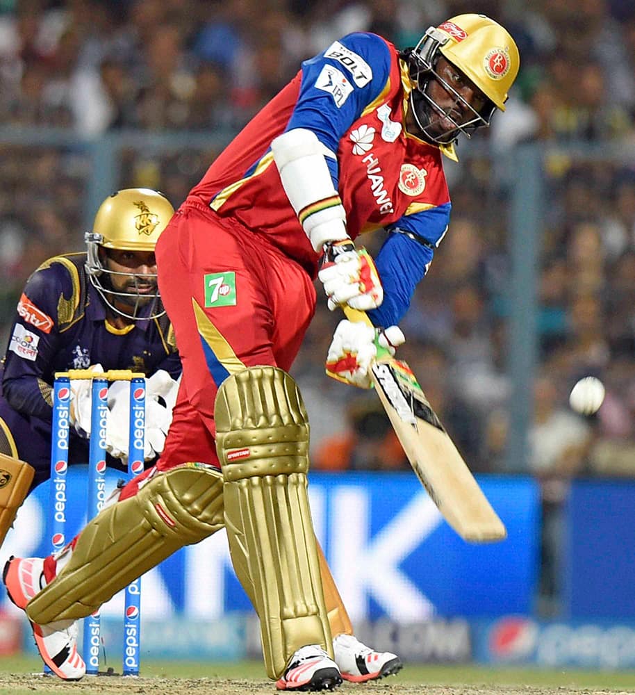 RCB player Chris Gayle plays a shot against Kolkata Knight Riders during an IPL-2015 match at Eden Garden in Kolkata.