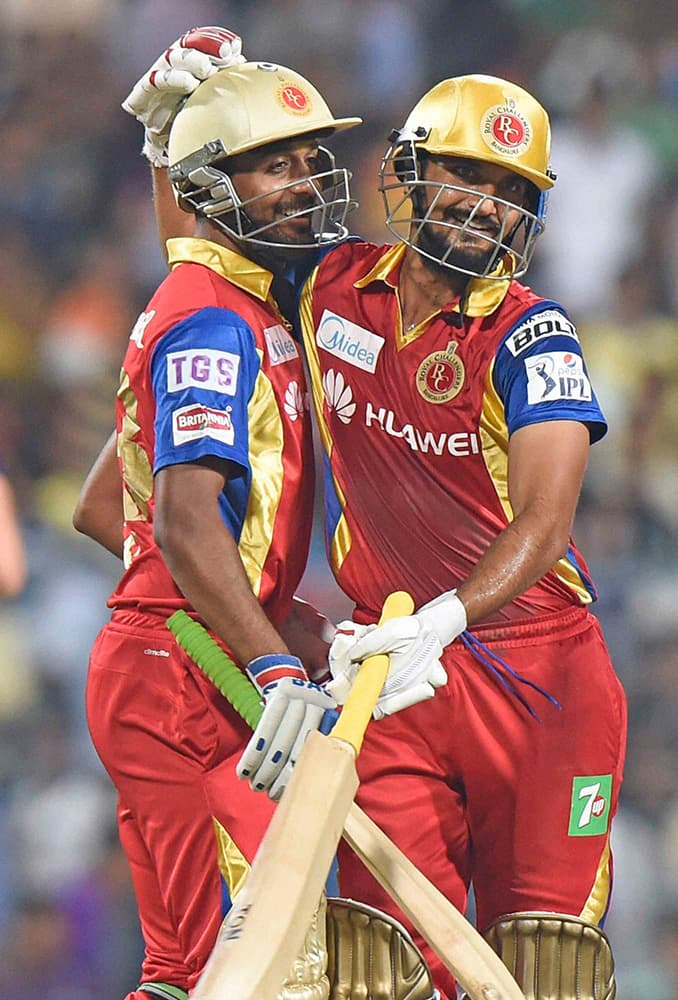 RCB player Harshal Patel and Abu Nechim celebrates after win over Kolkata Knight Riders during theirIPL-2015 match at Eden Garden in Kolkata.