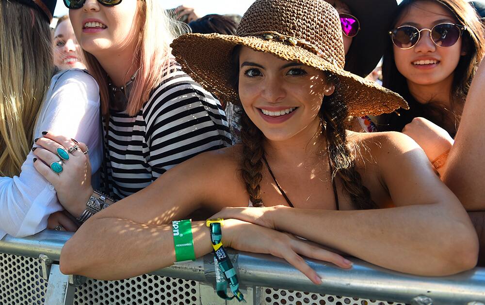 A concert goer poses for a photo at the 2015 Coachella Music and Arts Festival.