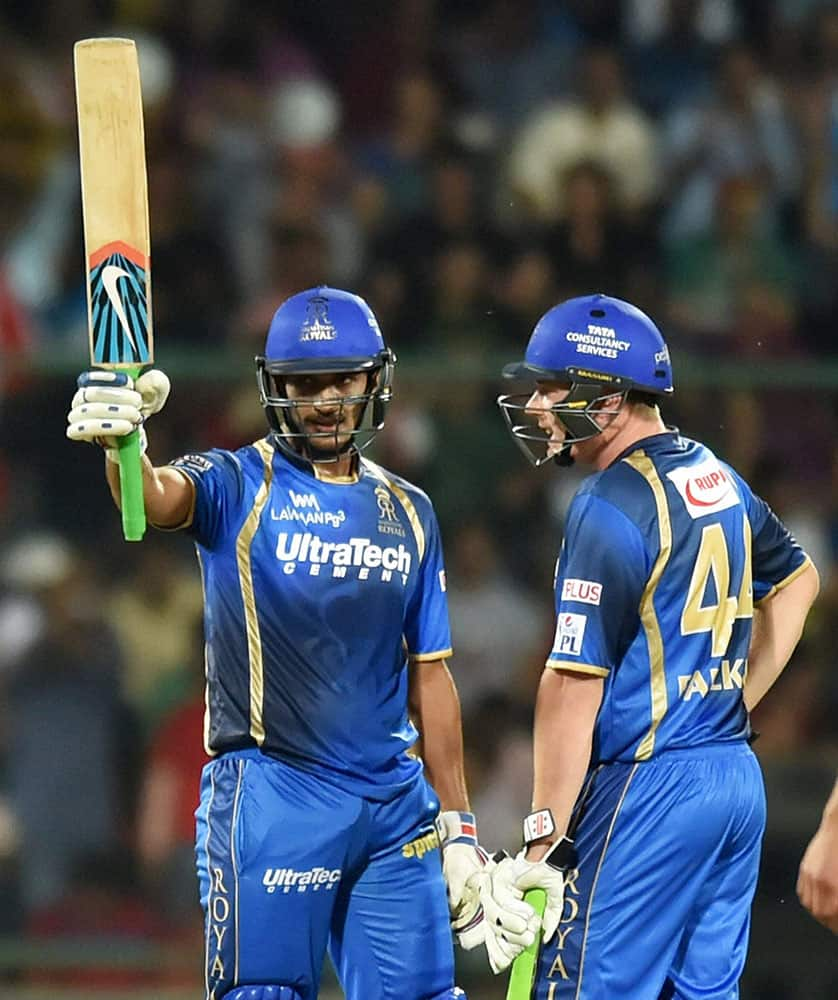 Rajasthan Royals batsman Deepak Hooda raises his bat after completing his half century during an IPL match against Delhi Daredevils in New Delhi.