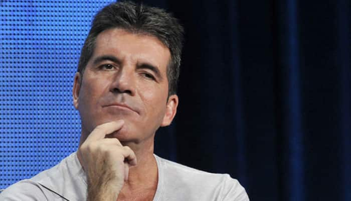 Simon Cowell fails to quit smoking