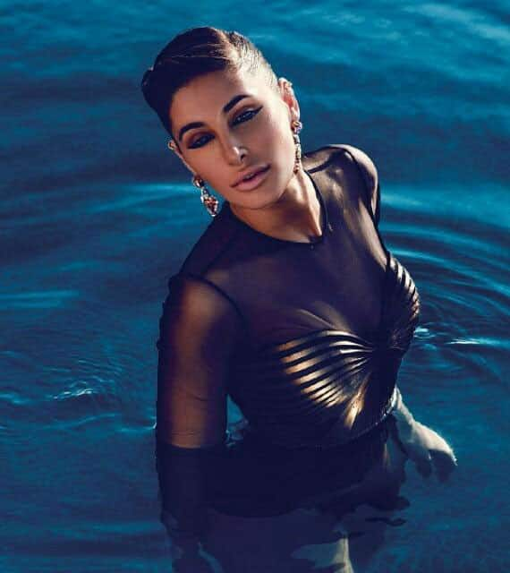 Nargis fakhri sizzles in black  bikini for Femina magazine April 2015 issue.-twitter
