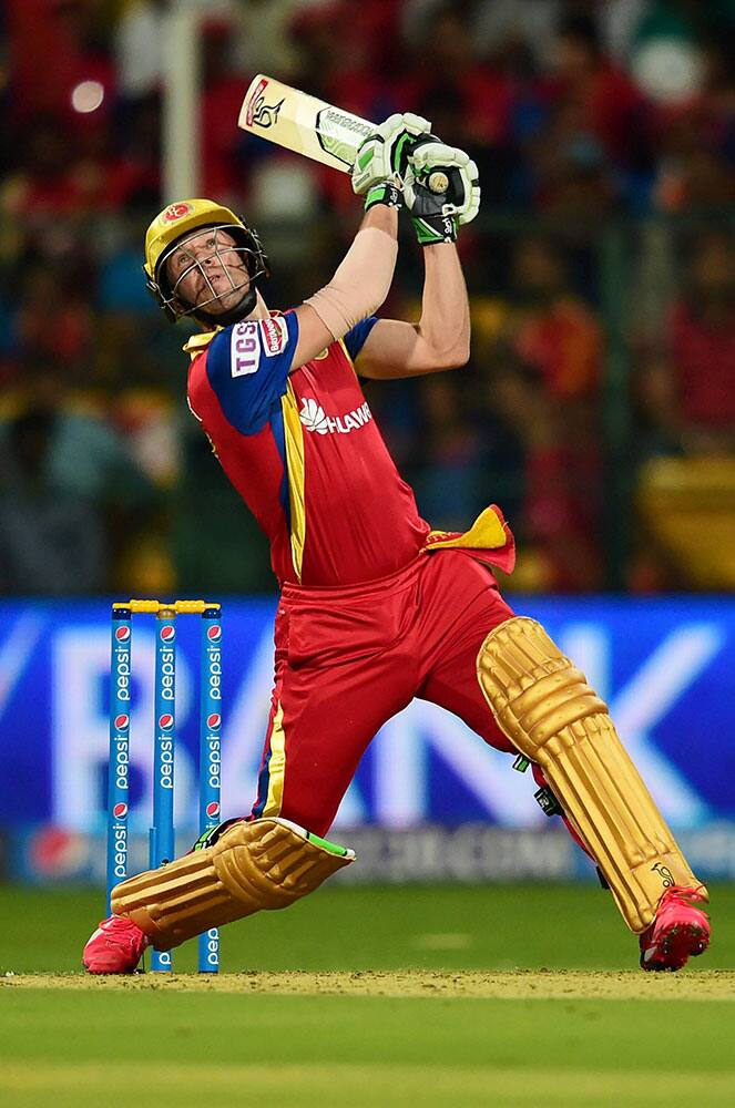 Royal Challengers batsman AB De Villiers plays a shot during IPL 8 match against Sunrisers Hyderabad at Chinnaswamy Stadium in Bengaluru.