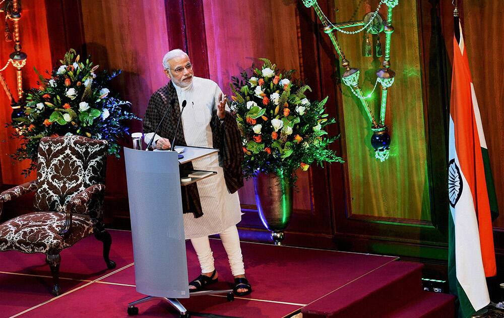 Prime Minister Narendra Modi addresses the Indian community during a reception hosted by the Indian Ambassador in Berlin.