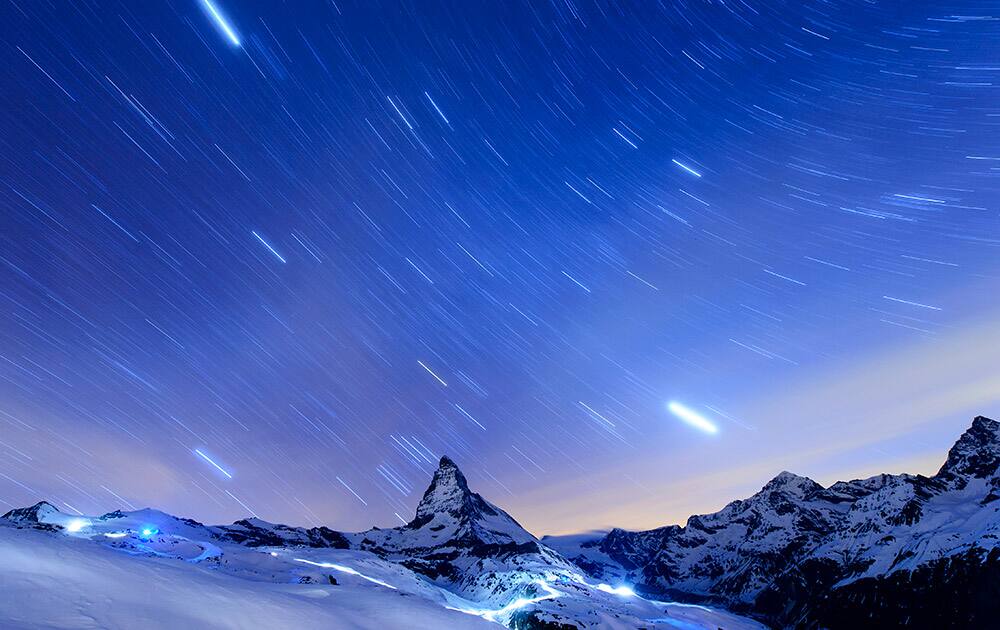 Stars are pictured over the famous Matterhorn mountain, seen from the Riffelberg area, in Zermatt, Switzerland.