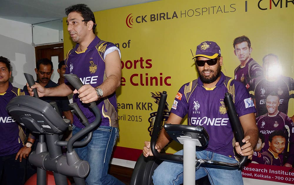 KKR players Yusuf Pathan and Azhar Mahmood at the launch of Sports Medicine clinic at Calcutta Medical Reserach Institute Hospital in Kolkata.