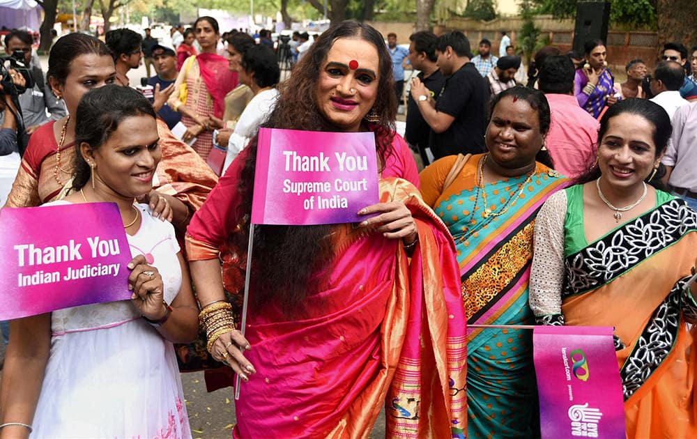 Transgender activist Laxmi Narayan Tripathi (L) during an event celebrating one year of the Supreme Court judgement recognising the Third Gender in New Delhi.