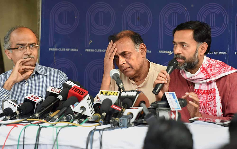 Rebel AAP leaders Yogendra Yadav, Anand Kumar and Prashant Bhushan during a press conference in New Delhi.