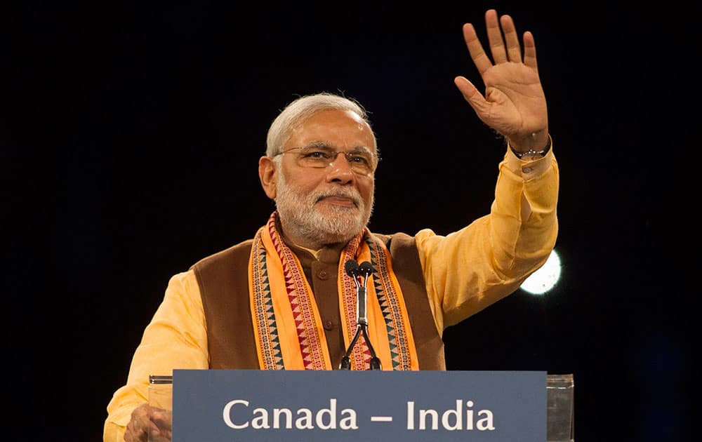 Prime Minister Narendra Modi addresses the crowd during an event in Toronto.