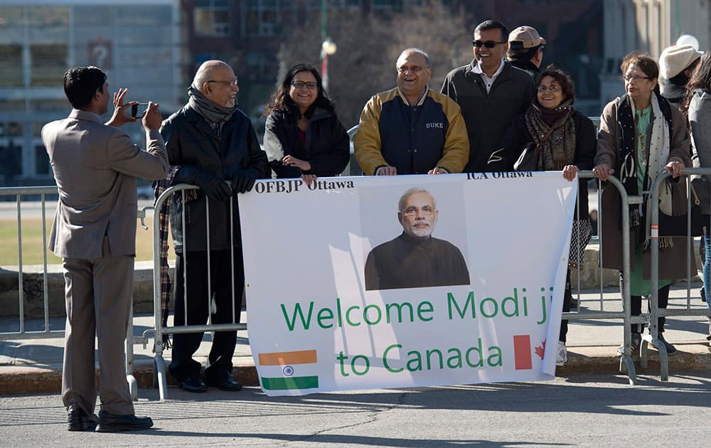 Supporters wait for Prime Minister Narendra Modi to arrive on Parliament Hill in Ottawa.