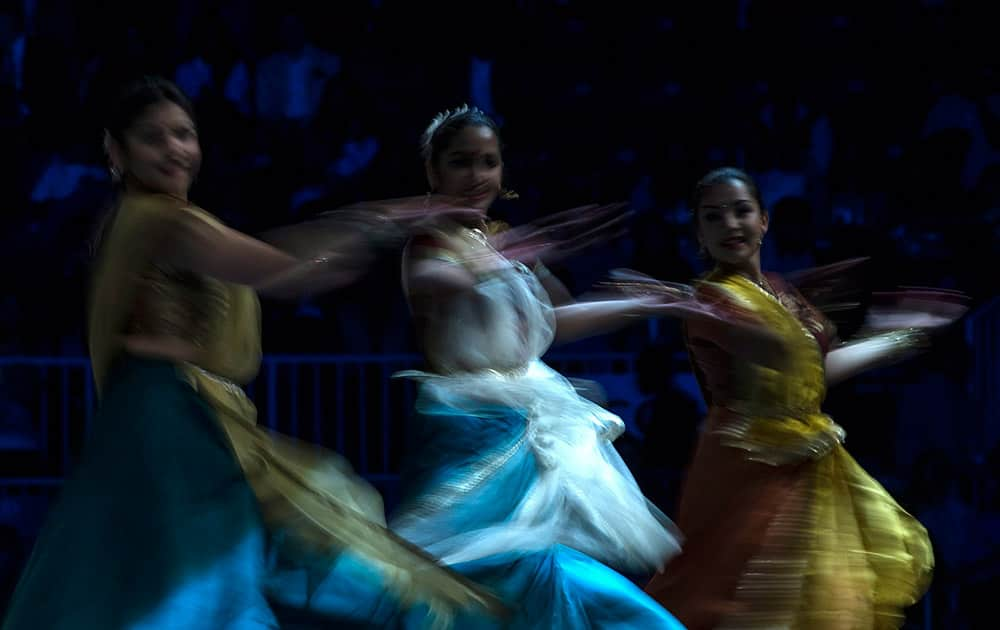 Dancers perform ahead of an event attended by Prime Minister Narendra Modi and Canadian Prime Minister Stephen Harper in Toronto.