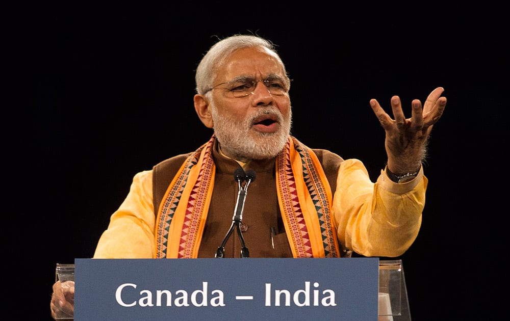 Prime Minister Narendra Modi addresses the crowd during an event in Toronto.