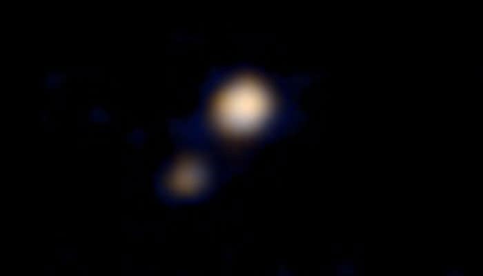 NASA reveals first-ever colour image of Pluto