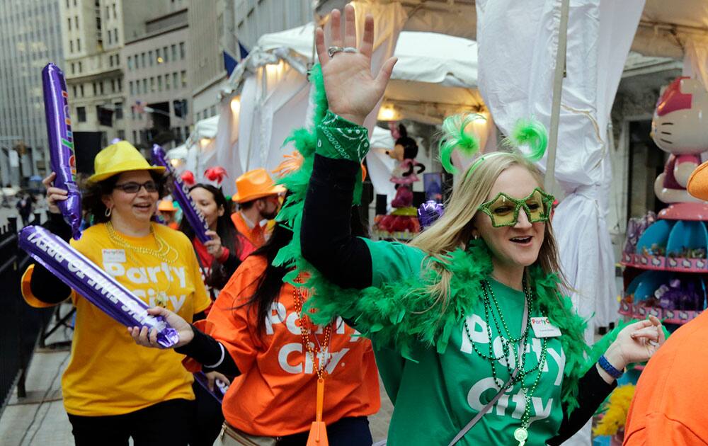 Party City employee revelers celebrate outside the New York Stock Exchange, prior to the company's IPO.