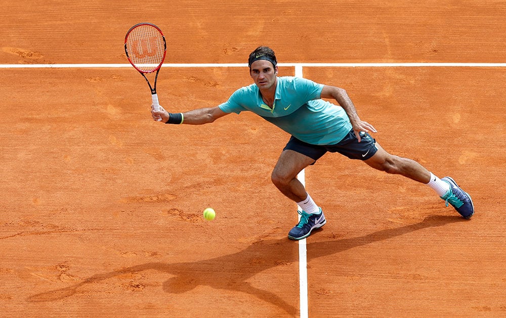 Roger Federer of Switzerland plays a return to Gael Monfils of France during their match of the Monte Carlo Tennis Masters tournament in Monaco.