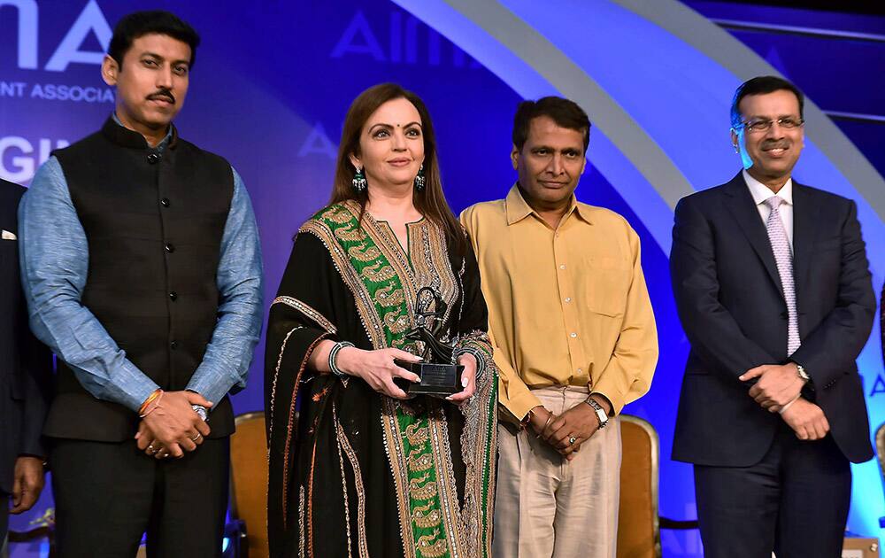 Nita M Ambani, Founder & Chairperson, Reliance Foundation poses after receiving 'Entrepreneur of the Year' award at AIMA Managing India Awards 2015, in New Delhi.