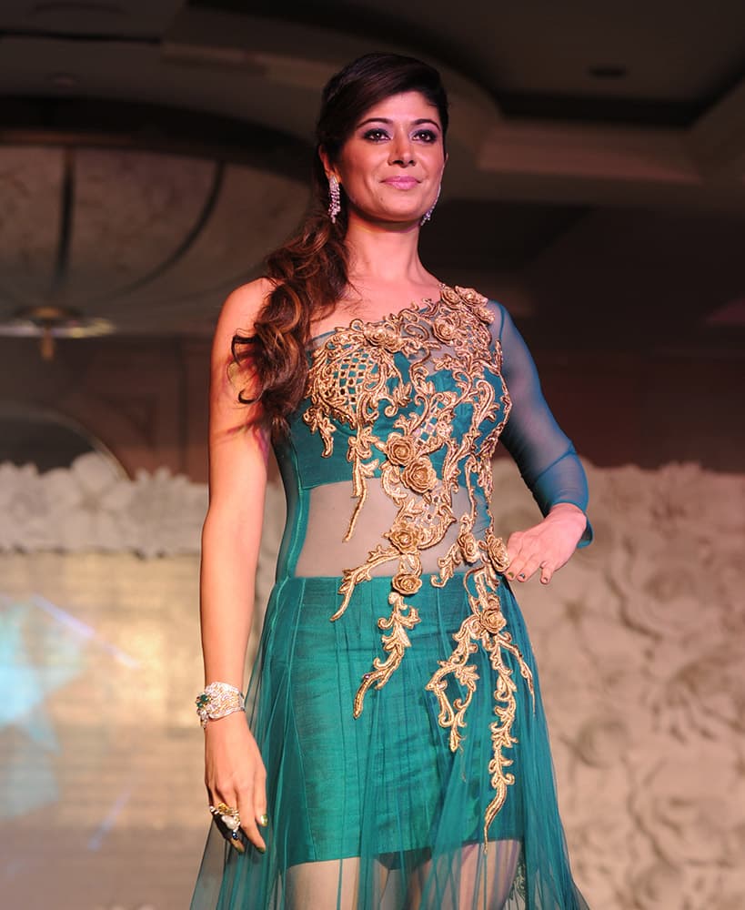 Pooja Batra walks the ramp at a fashion show organised for the cause of stopping girl child abuse, in collaboration with NGO Beti in Mumbai. DNA