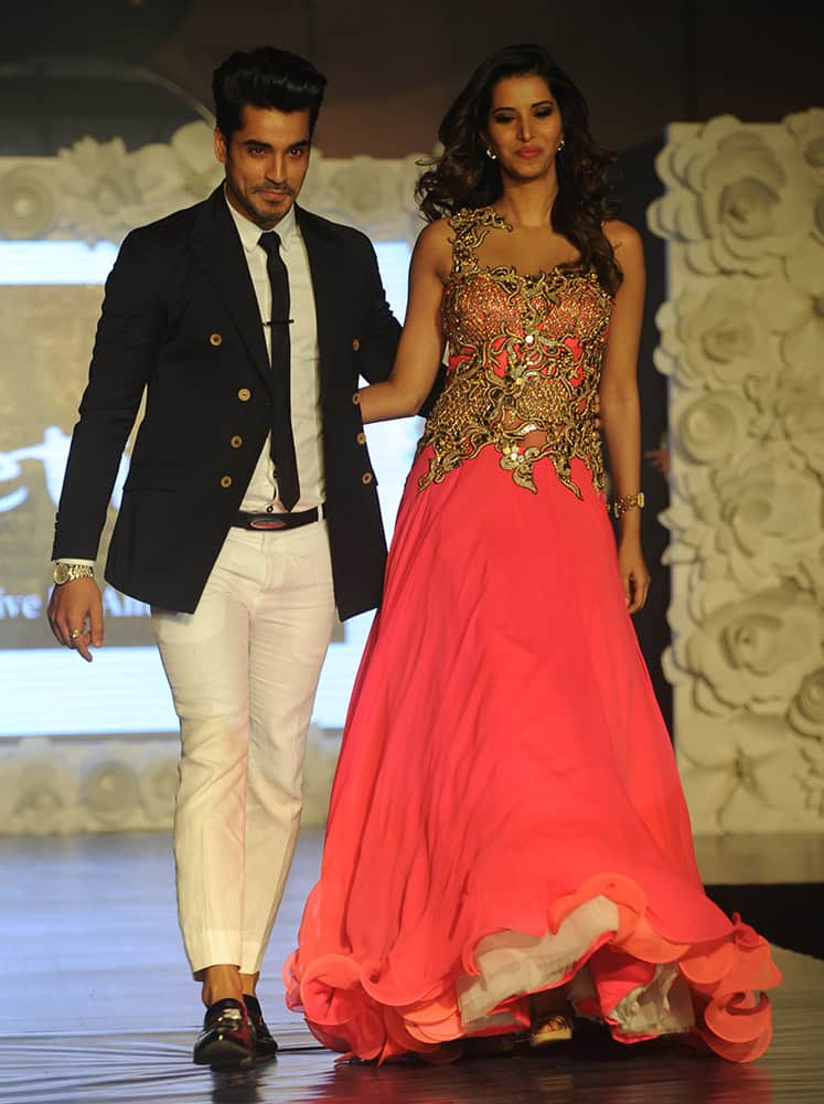 Gautam Gulati walks the ramp at a fashion show organised for the cause of stopping girl child abuse, in collaboration with NGO Beti in Mumbai. DNA