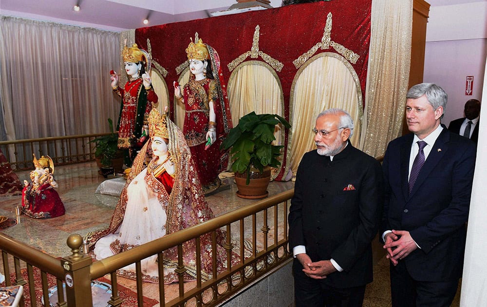 Prime Minister Narendra Modi and his Canadian counterpart Stephen Harper during a visit to the Laxmi Narayan Temple in Vancouver.