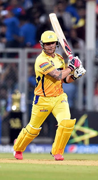 Chennai Super Kings batsman Brendon McCullum plays a shot against Mumbai Indians during an IPL T20 match in Mumbai.