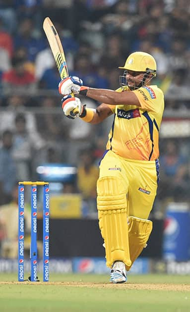 Chennai Super Kings batsman Suresh Raina plays a shot against Mumbai Indians during an IPL T20 match in Mumbai.