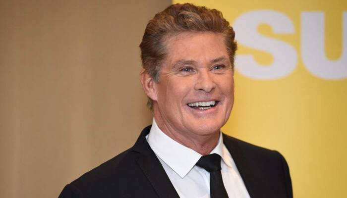 David Hasselhoff rides a dinosaur in new music video