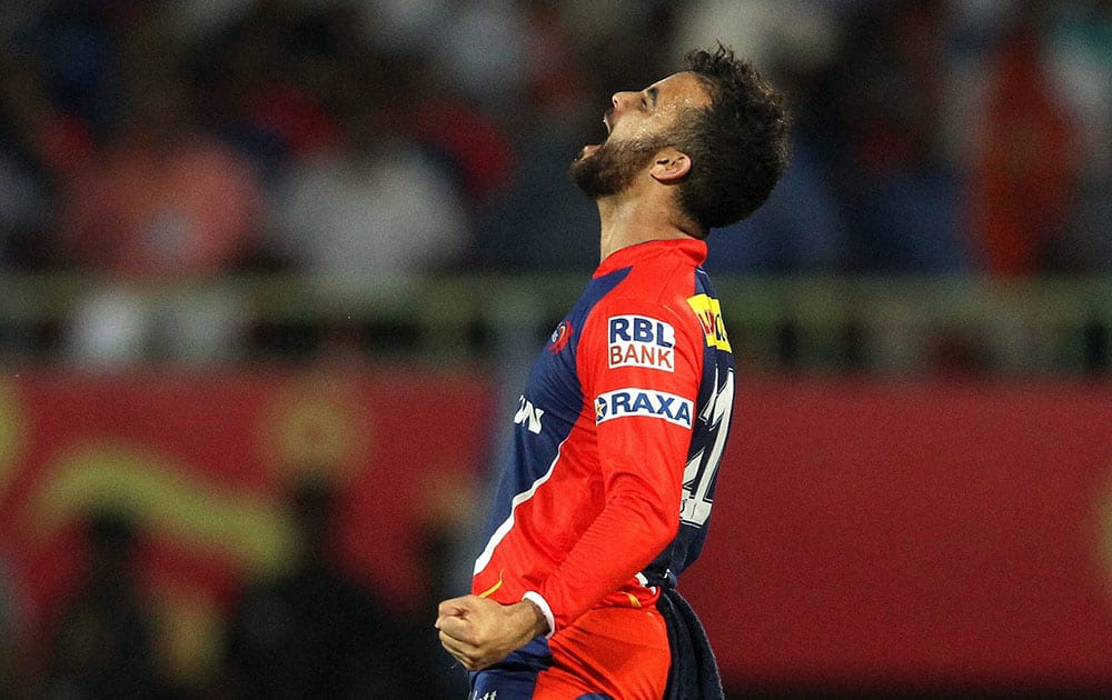 Delhi Daredevils captain Jean-Paul Duminy celebrates after getting Sunrisers Hyderabad captain David Warners wicket during IPL match in Visakhapatnam.