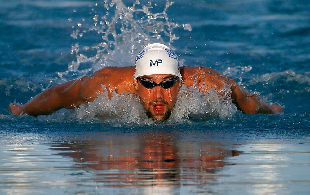 Michael Phelps competes in the men's 200 meter individual medley final,  at the Arena Pro Swim Series in Mesa, Ariz.