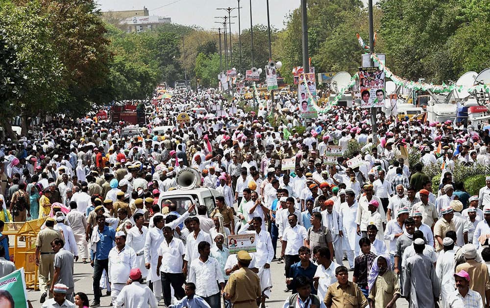 Congress Party supporters come in swarms during the farmers rally at Ramlila Maidan in New Delhi.