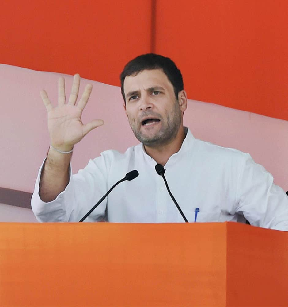 Congress Vice President Rahul Gandhi addresses the large gathering during the farmers rally at Ramlila Maidan in New Delhi.