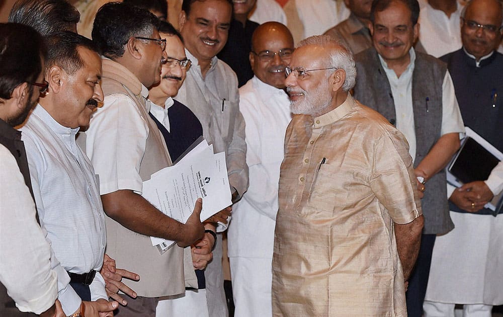 Prime Minister Narendra Modi greets senior BJP leaders and ministers during Garib Kalyan Yojana, a workshop about the various pro poor policies initiated by the Government for party MPs in New Delhi.