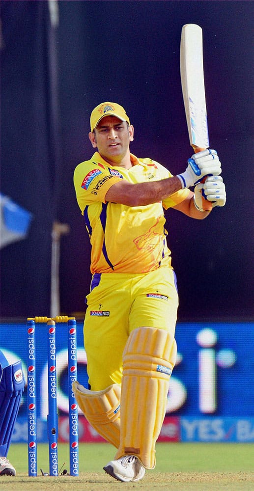 Mahendra Singh Dhoni hits a shot during a match between Rajasthan Royals and Chennai Super Kings at Motera Stadium in Ahmedabad.