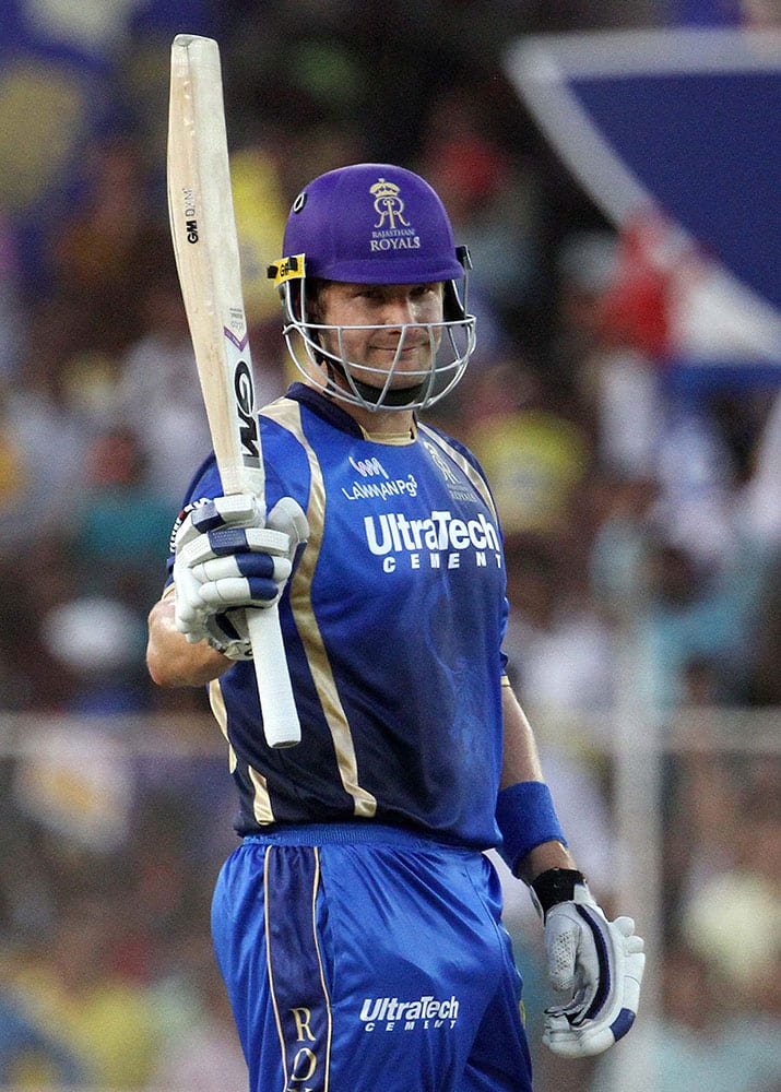 Rajasthan Royals captain Shane Watson waves after scoring a fifty during a T-20 match with Chennai Super Kings in Ahmedabad.