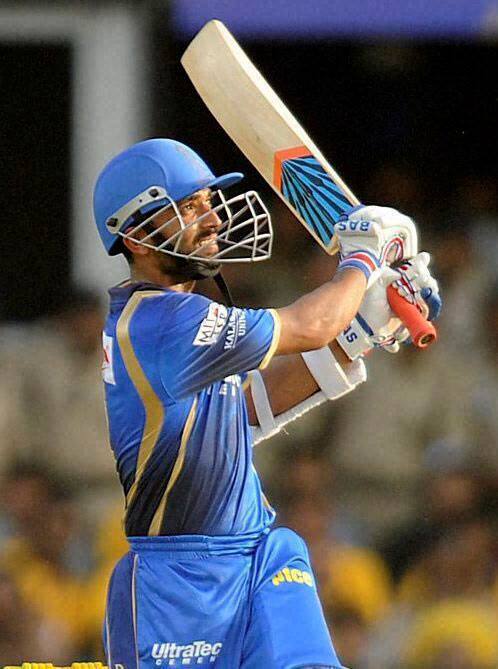 Rajasthan Royals player Ajinkya Rahane smashes a shot during a T-20 match with Chennai Super Kings in Ahmedabad.