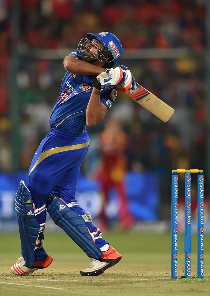 Mumbai IndiansRohit Sharma plays a shot against Royal Challengers Bangalore during IPL 8 match in Bengaluru.