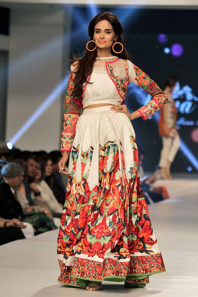 A model presents creations by Pakistani designer Hina Butt on the second-day of PFDC Sunsilk Fashion Week Spring/Summer 2015 in Lahore.