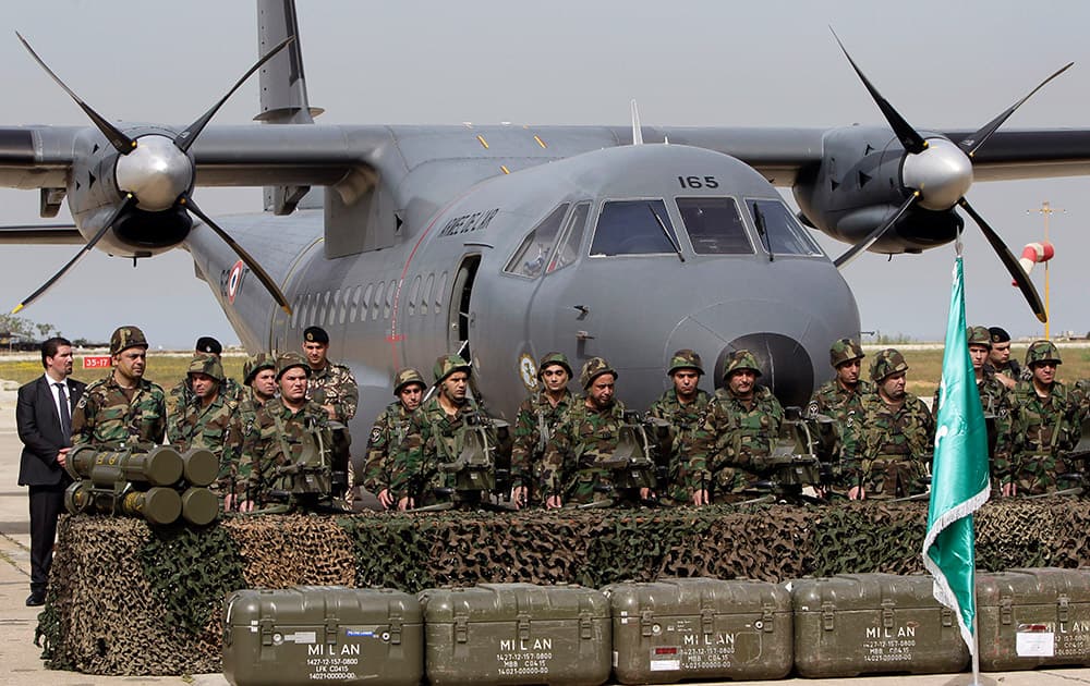 Lebanese army soldiers stand in front of French weapons at the Rafik Hariri International Airport in Beirut, Lebanon. Lebanon has received the first shipment of $3 billion worth of French weapons paid for by Saudi Arabia. 